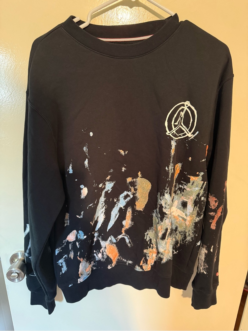 Jordan Black Crewneck Sweater with Multicolor Paint-Splash Accents